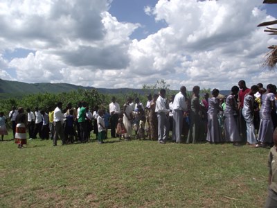 Members of the Nyarwana congregation greeting one another after service