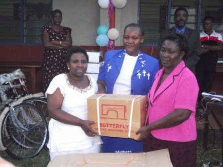Mothers Union Leaders receiving treadle sewing machines