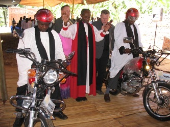 Bishop-Mwita-Akiri-blessing-motorcycles-in-January-2014.
