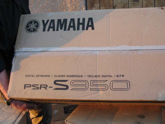 A box containing Yamaha Keyboard