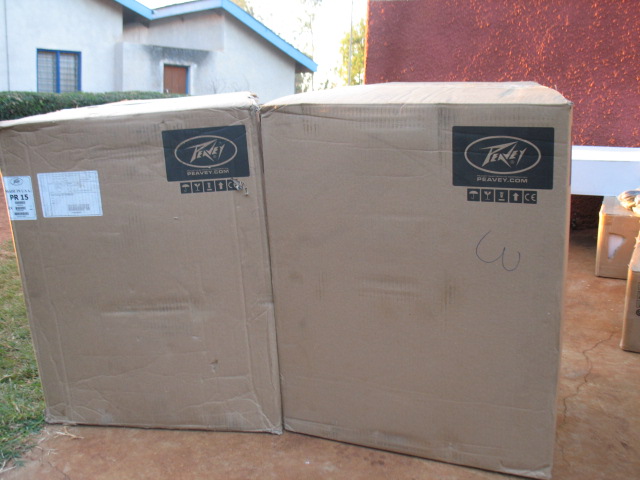Boxes containing Peavey Speakers