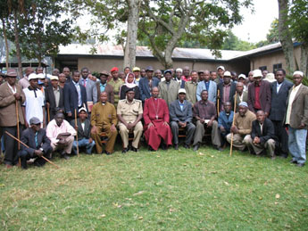 Bishop Mwita in a group photo with Community-Clan Leaders in Tarime  after the meeting at Mogabiri Agricultural Centre on 23 July 2012.
