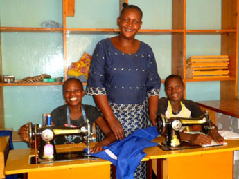 Mrs Jane Nyageswa instructor, with the students.