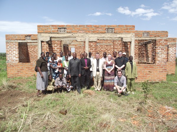A photo in front of the Kemnage pastor's house under construction